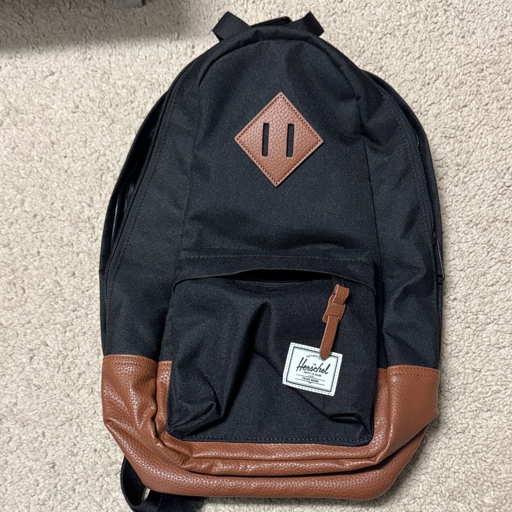 Herschel Supply Company Black and Tan sling bag